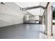 Spacious garage with epoxy flooring and storage cabinets at 355 Glynnwilde Nw Dr, Marietta, GA 30064