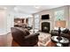 Inviting living room with a cozy fireplace and comfortable seating area at 355 Glynnwilde Nw Dr, Marietta, GA 30064