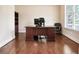 Spacious home office with rich hardwood floors and large window at 355 Glynnwilde Nw Dr, Marietta, GA 30064