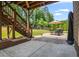 Covered patio with outdoor seating and dining, offers a comfortable space for relaxation at 355 Glynnwilde Nw Dr, Marietta, GA 30064