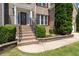 Close up view of the front porch, steps leading to the porch and front door at 3717 Shady Maple Dr, Stonecrest, GA 30038
