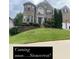 Charming brick home features a well-manicured lawn and an inviting entrance with manicured shrubs at 3717 Shady Maple Dr, Stonecrest, GA 30038