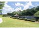 Well-maintained tennis courts and lush landscaping provide a beautiful outdoor space for recreation at 3717 Shady Maple Dr, Stonecrest, GA 30038