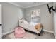 Bright bedroom with carpet, one bed, and window offering natural light at 728 Harmony Rd, Temple, GA 30179