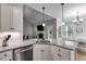 Spacious kitchen with granite countertops and a view into the living room at 728 Harmony Rd, Temple, GA 30179