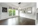 Bright dining room featuring elegant trim, large windows, and hardwood floors at 3130 Woodwalk Se Trce # 8, Atlanta, GA 30339