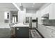 Open kitchen featuring a stylish island, stainless appliances, and seamless access to living spaces at 3130 Woodwalk Se Trce # 8, Atlanta, GA 30339
