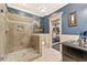 Beautiful bathroom with a glass shower enclosure, modern fixtures, and access to a gym at 3750 Maryhill Nw Ln, Kennesaw, GA 30152
