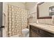 Bathroom featuring a vanity with granite countertop and a shower/tub combination at 3750 Maryhill Nw Ln, Kennesaw, GA 30152