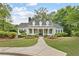 Beautiful single-story home with manicured lawn, inviting walkway, and classic curb appeal at 3750 Maryhill Nw Ln, Kennesaw, GA 30152