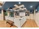 Basement media room with a large screen, comfortable seating, and custom ceiling design at 3750 Maryhill Nw Ln, Kennesaw, GA 30152