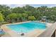 Inviting community pool with lounge chairs, umbrellas, and a playground, perfect for relaxation at 3750 Maryhill Nw Ln, Kennesaw, GA 30152