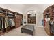 This large walk-in closet is equipped with custom shelves and plenty of hanging space at 3750 Maryhill Nw Ln, Kennesaw, GA 30152