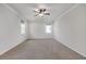 Expansive bedroom with plush carpeting, ample natural light, and ceiling fan at 776 Clifftop Xing Xing, Powder Springs, GA 30127