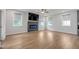 Spacious living room with a sleek electric fireplace and large windows at 776 Clifftop Xing Xing, Powder Springs, GA 30127