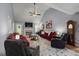 Spacious living room features vaulted ceilings, fireplace, and comfortable seating at 107 Hearthstone Walk, Woodstock, GA 30189