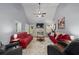 Bright living room with vaulted ceilings, fireplace, and ample seating arrangement at 107 Hearthstone Walk, Woodstock, GA 30189