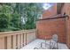 Relaxing balcony area with outdoor seating surrounded by lush greenery for peaceful enjoyment at 3074 Vinings Ridge Se Dr, Atlanta, GA 30339