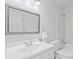 Bright bathroom with a white vanity and large mirror at 3074 Vinings Ridge Se Dr, Atlanta, GA 30339