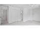 Spacious bedroom with carpet, a ceiling fan, and several doors at 3074 Vinings Ridge Se Dr, Atlanta, GA 30339