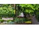 Entrance to Vinings Village featuring lush landscaping and community signage at 3074 Vinings Ridge Se Dr, Atlanta, GA 30339