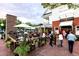 Exterior view of Paces & Vine restaurant at twilight with outdoor seating and a lively ambiance at 3074 Vinings Ridge Se Dr, Atlanta, GA 30339
