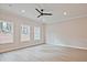 Large open living area with modern flooring, offering plenty of space for furnishings and natural light, great for relaxing at 174 Bluffington Way, Marietta, GA 30066