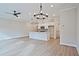 Bright, open-concept living space featuring sleek floors, modern lighting, and a stylish kitchen island, great for entertaining at 174 Bluffington Way, Marietta, GA 30066