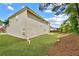 Large backyard with lush green grass and mature trees at 1955 Pius Dr, Ellenwood, GA 30294