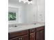 Bathroom showcasing a large mirror and double sinks at 1955 Pius Dr, Ellenwood, GA 30294