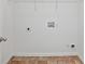 Empty laundry room with tile floor and door at 1955 Pius Dr, Ellenwood, GA 30294