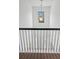 Stairwell featuring modern fixture and natural light from large window at 1955 Pius Dr, Ellenwood, GA 30294