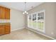Cozy breakfast nook with tile floors, a large window, and plenty of natural light at 231 Yardsley Dr, Mcdonough, GA 30253