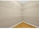 Walk-in closet features tiled floor and wire shelving at 231 Yardsley Dr, Mcdonough, GA 30253