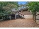 The backyard features a deck and plenty of space, all enclosed with a fence at 286 Indian Trl, Marietta, GA 30068
