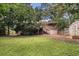Spacious backyard with mature trees, offering plenty of room for recreation and relaxation at 286 Indian Trl, Marietta, GA 30068