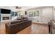 Bright and airy living room featuring hardwood floors, fireplace, and custom built-in shelving at 286 Indian Trl, Marietta, GA 30068