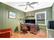 Inviting office space featuring hardwood floors, great natural light and a ceiling fan at 286 Indian Trl, Marietta, GA 30068