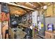 Unfinished basement with exposed ceiling and open workshop area at 6425 Riley Manor Way, Cumming, GA 30028