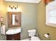Charming half bathroom with updated fixtures and wainscoting at 6425 Riley Manor Way, Cumming, GA 30028