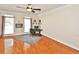 Spacious office with hardwood floors, natural light, and an area rug at 6425 Riley Manor Way, Cumming, GA 30028