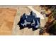 Stunning aerial view of the home's architecture, driveway, and surrounding landscape at 115 Palisade Dr, Rydal, GA 30171