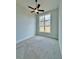 Comfortable bedroom with carpet and a large window, providing ample natural light at 115 Palisade Dr, Rydal, GA 30171