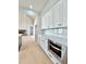 Modern kitchen showcases white cabinets, stainless steel appliances, and a bright, open layout at 115 Palisade Dr, Rydal, GA 30171