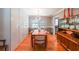 Dining room with hardwood floors, modern chandelier, and minimalist decor at 3530 Embry Circle Cir, Atlanta, GA 30341