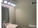 Bathroom with vanity lights, mirror and paint at 5950 Wintergreen Rd, Norcross, GA 30093