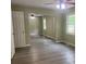 Bedroom features a sliding mirrored closet doors at 5950 Wintergreen Rd, Norcross, GA 30093