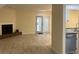 Spacious living room with fireplace and hardwood floors, seamlessly connected to the kitchen at 5950 Wintergreen Rd, Norcross, GA 30093