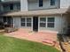 Cozy brick patio is the perfect space for outdoor relaxation and barbecues at 5950 Wintergreen Rd, Norcross, GA 30093