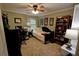 Bedroom featuring carpet, neutral walls, window, and a built in bookshelf at 36 Saint Claire Ne Ln, Atlanta, GA 30324